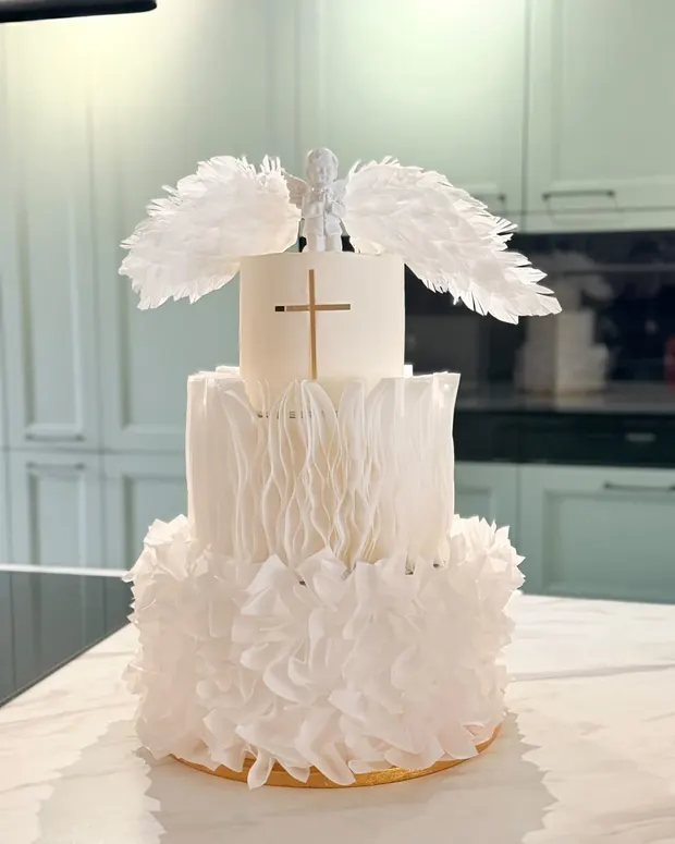 Christening cake with ruffles and angel wings