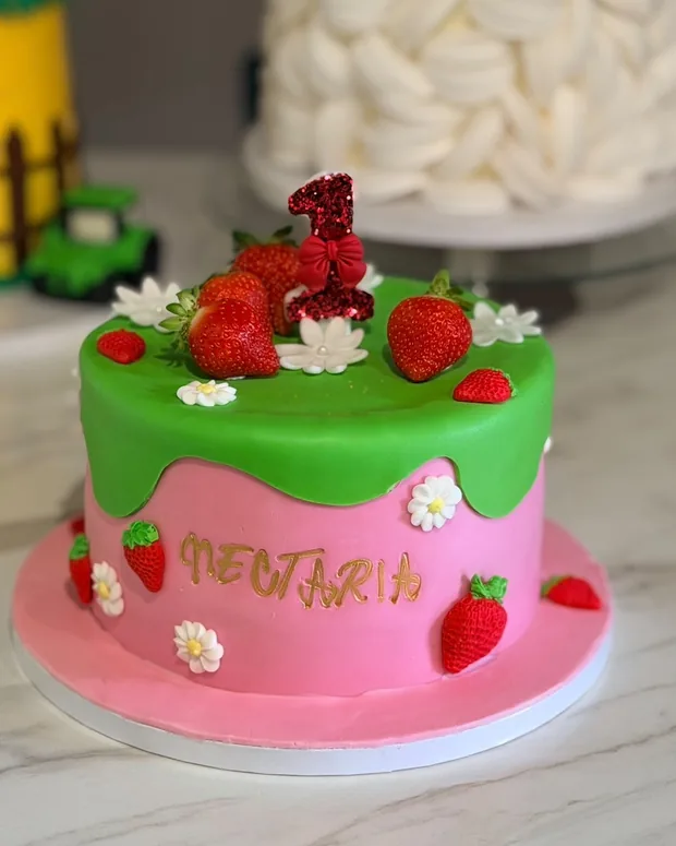 Green drip over pink, with strawberries
