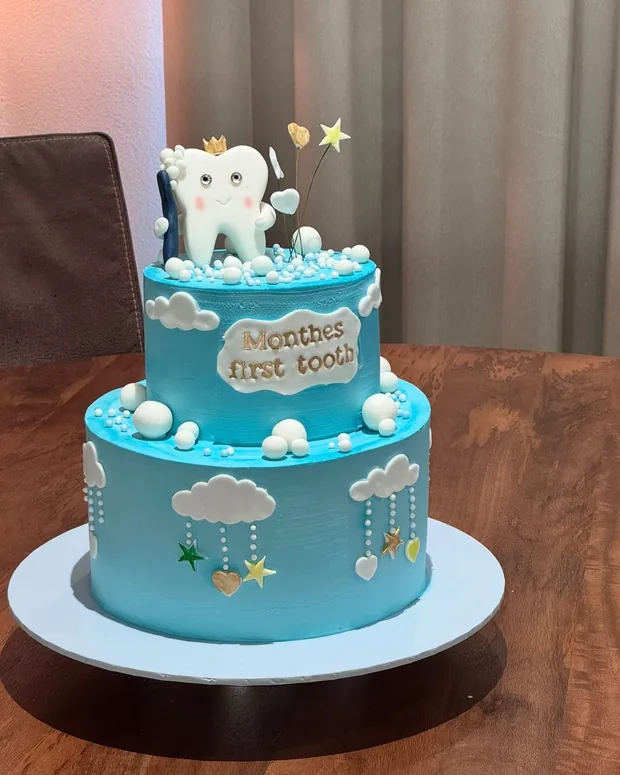 First tooth cake with little clouds