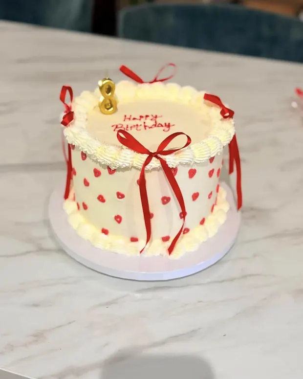 Red dots with a bow and golden bell
