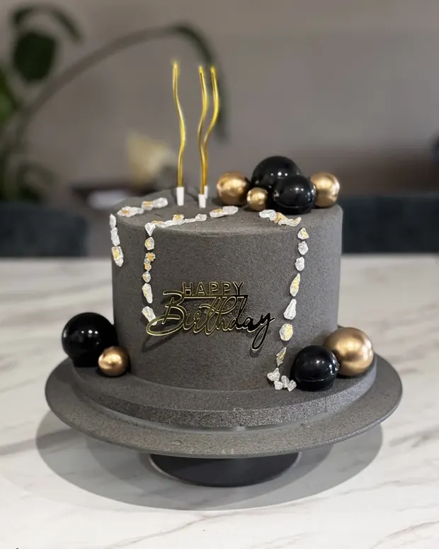 Black, gold and a touch of stone texture