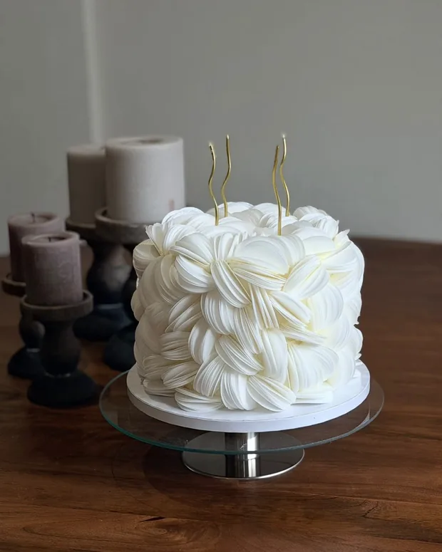 White cake with flowing ruffles
